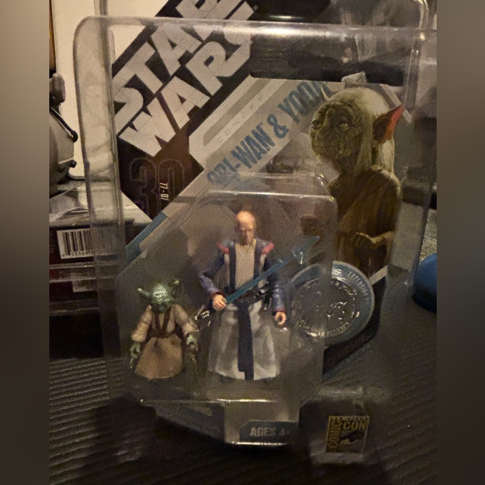 Star Wars McQuarrie concept figures: Obiwan & Yoda and Darth Vader.